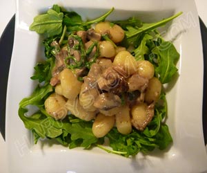 Gnocchi with Speck Prosciutto, Arugula, Mushrooms and Bechamel Sauce Gnocchi with Speck Prosciutto, Arugula, Mushrooms and Bechamel Sauce